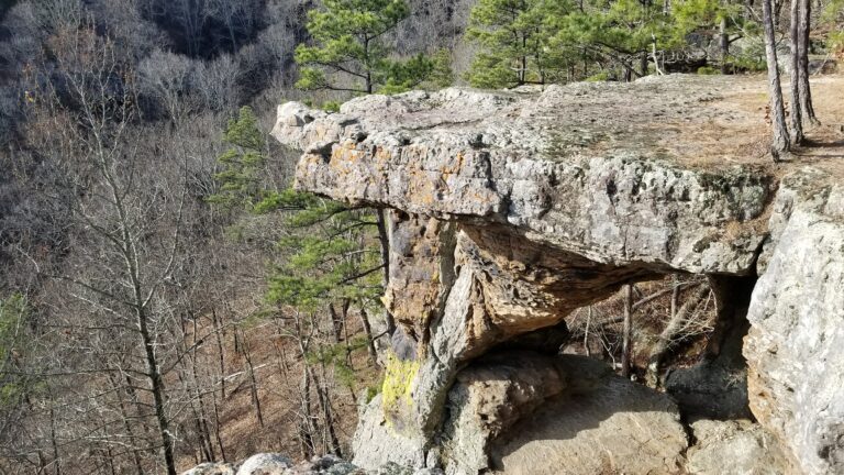 Pedestal Rocks Recreation Area in Ozark National Forest, featuring towering rock formations and scenic views of the surrounding forest.